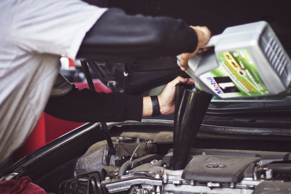 Mechanic servicing an engine